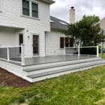 HMZ-Construction-back-deck-remodel-on-white-house